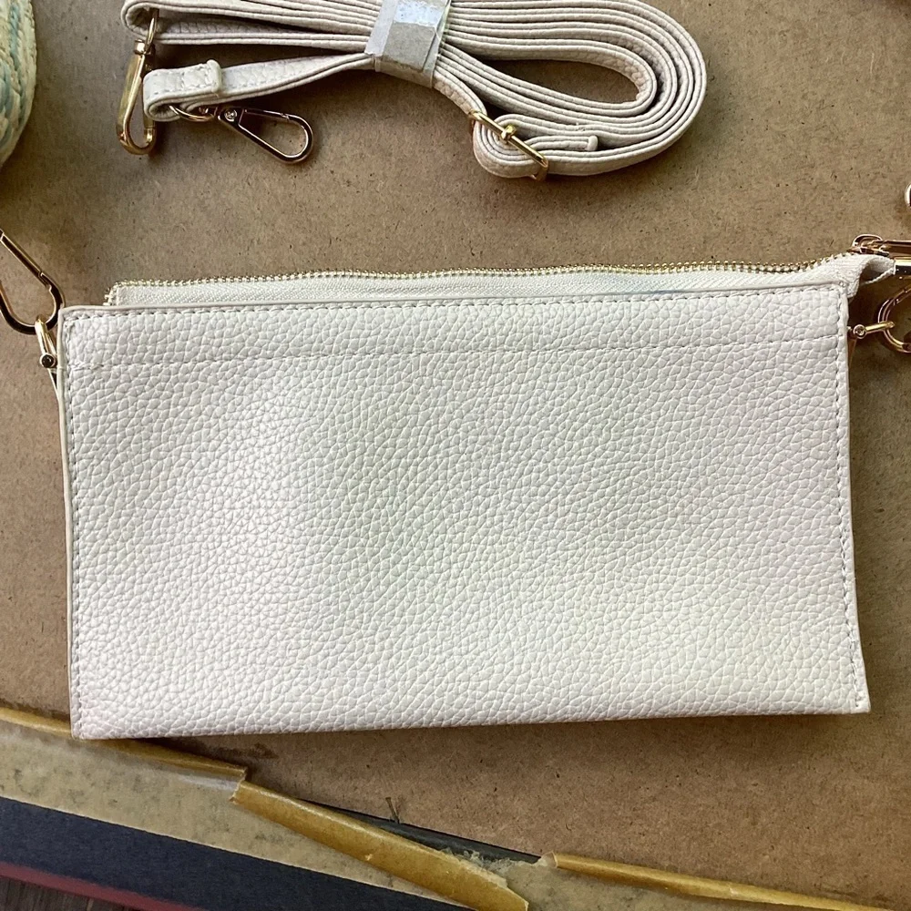 Unbranded off white three compartment bag with three removable straps
